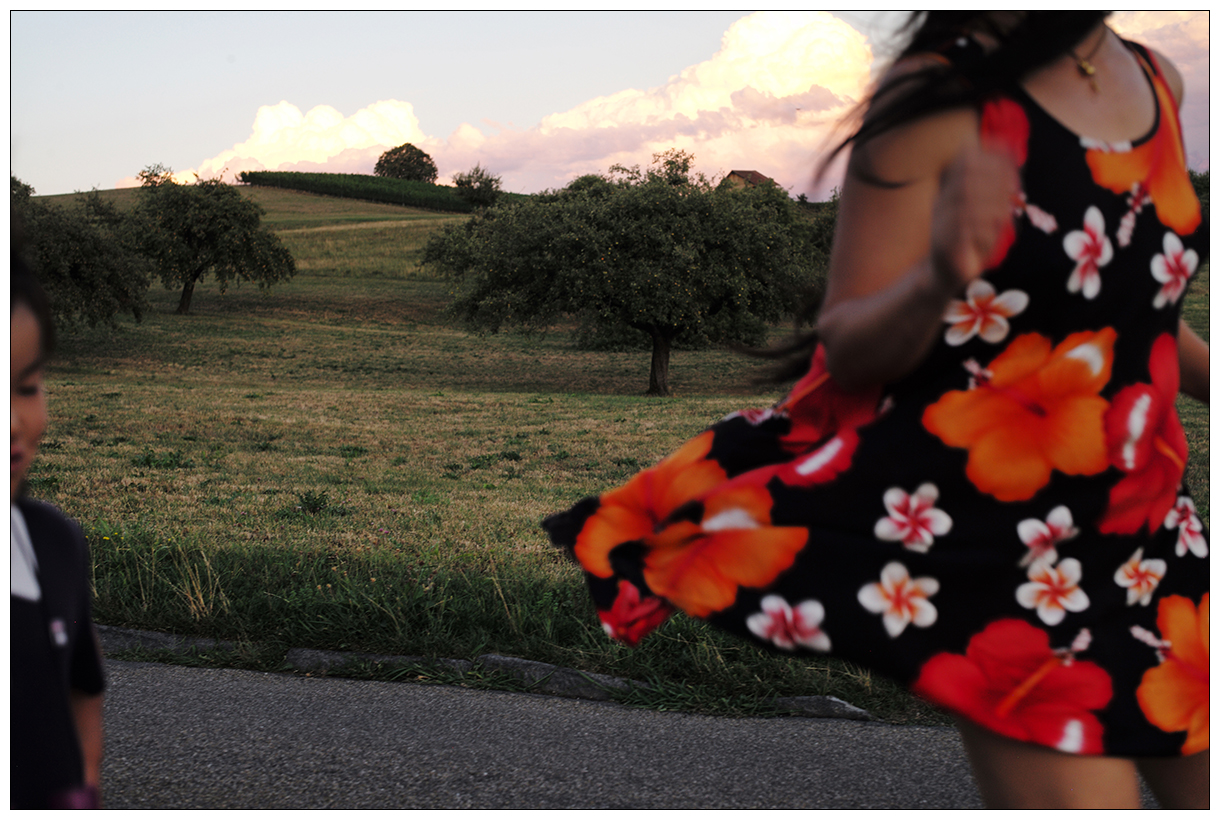 Yiyun Lin dancing in a field